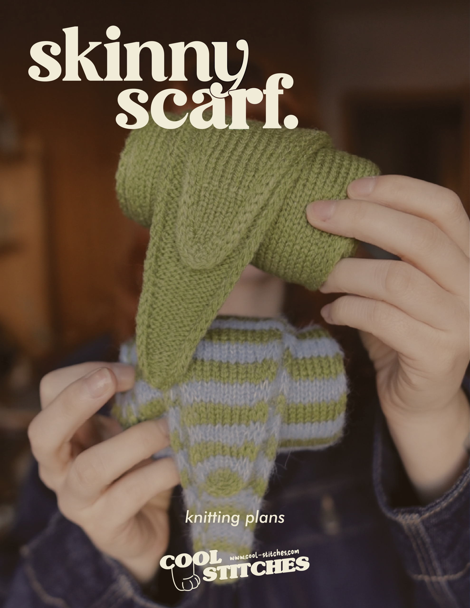 rolled up skinny scarves being held in white hands.